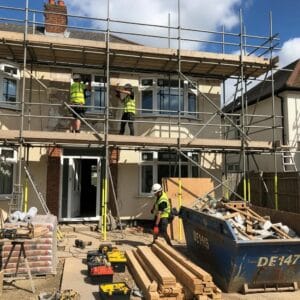 Contractors working on a home renovation, illustrating the FHA 203k process